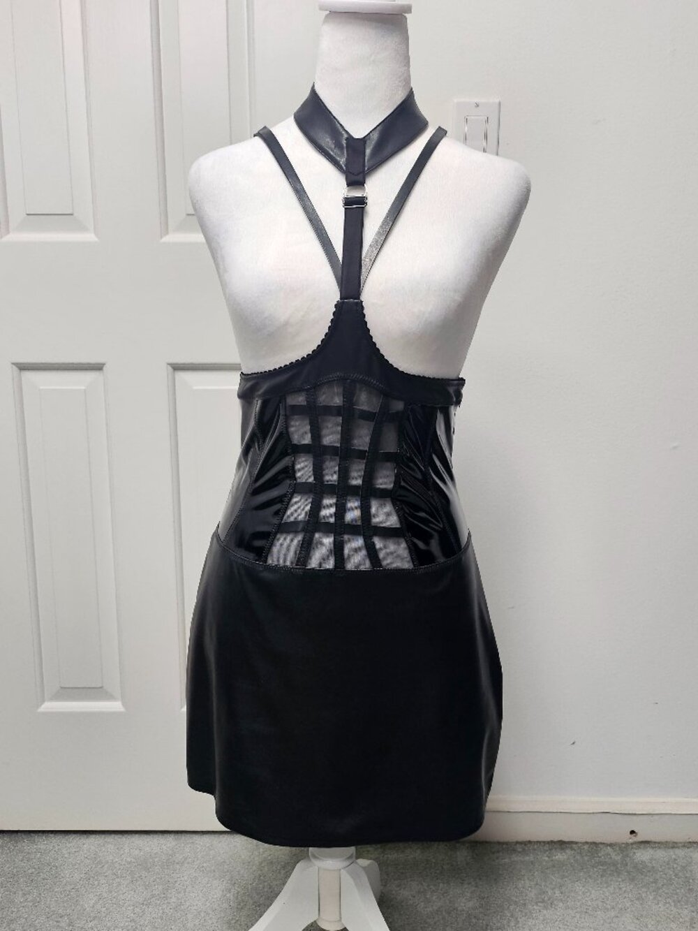Very sexy open top, corset body. halter neck black dress from France